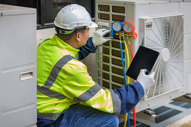 Professional Ac Installation technician working in Wellington, MO